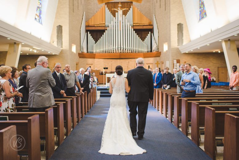 Bride walking down the aisle with her father