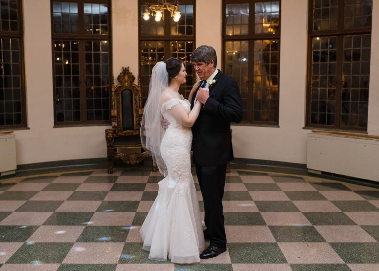 Bride dancing with father at wedding reception