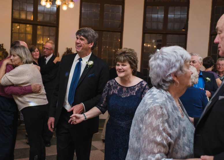 Older couples dancing at wedding reception