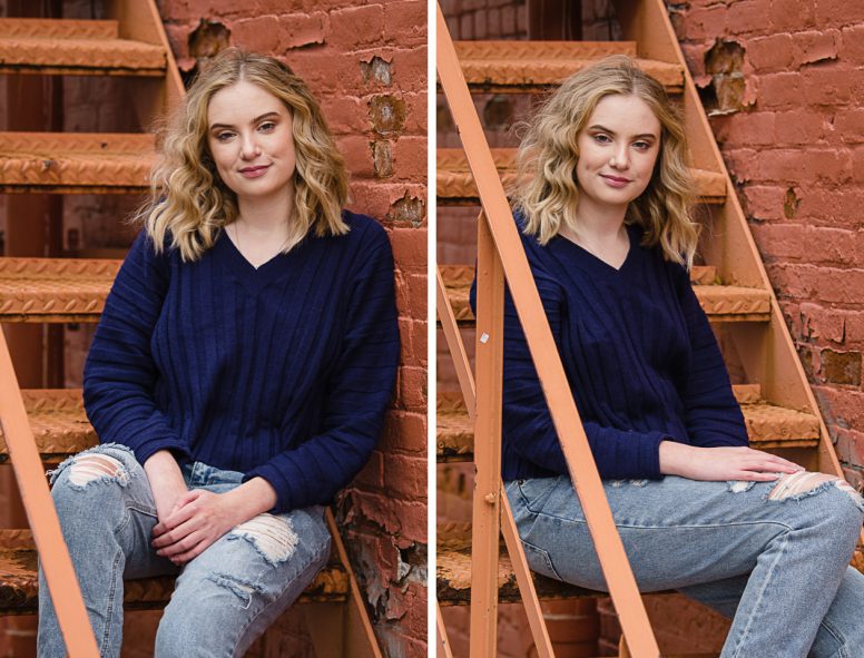 Beautiful young woman in blue sweater sitting on stairs